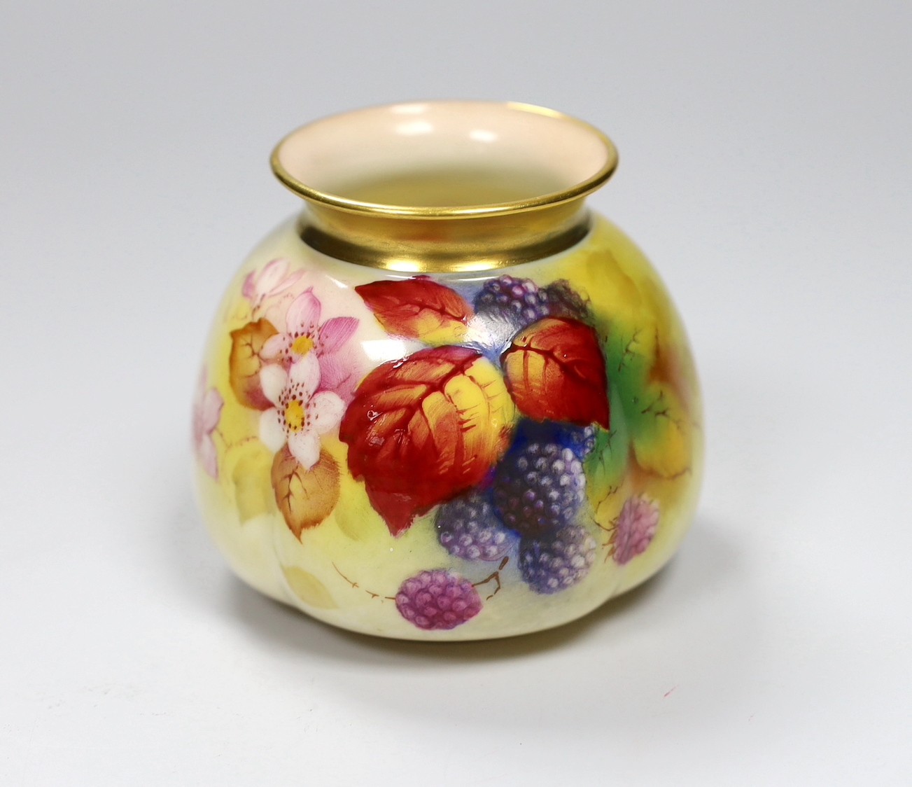 A Royal Worcester moulded vase shape 158H painted with autumnal leaves and berries by K. Blake, signed, date code 1939. 7.5cm high